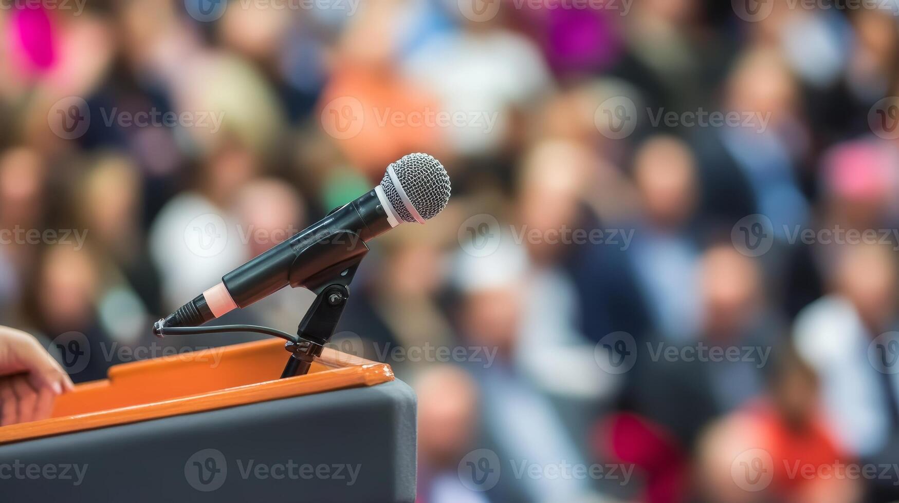 Public Speaking Microphone on Podium with Blurred Audience Background Conference Speech photo