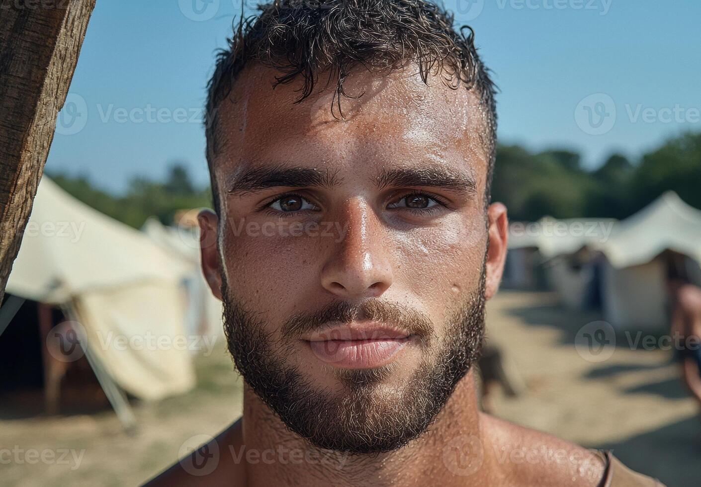 Close up portrait of a young man with a beard photo