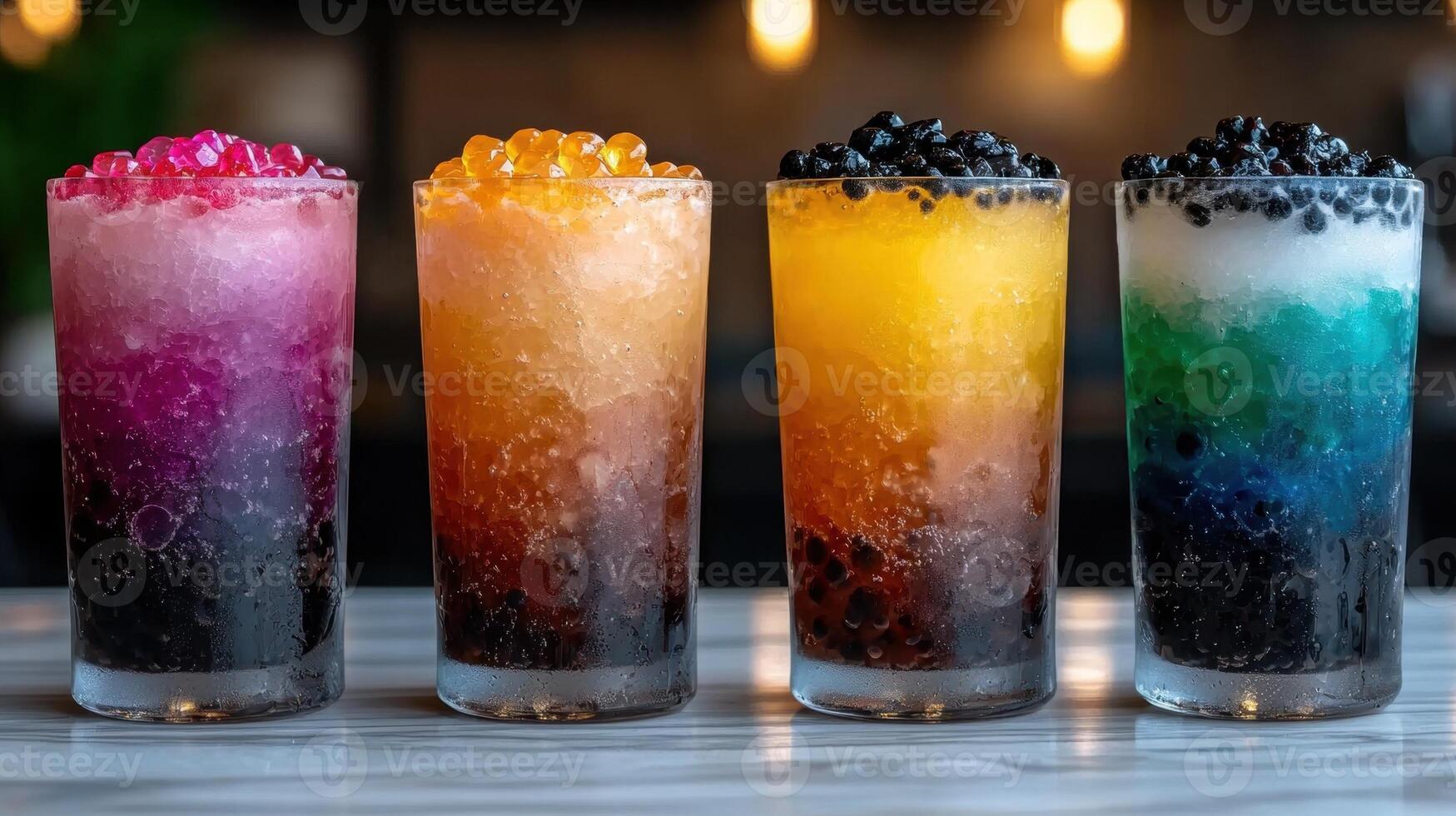 Rainbow bubble tea drinks with popping boba balls photo