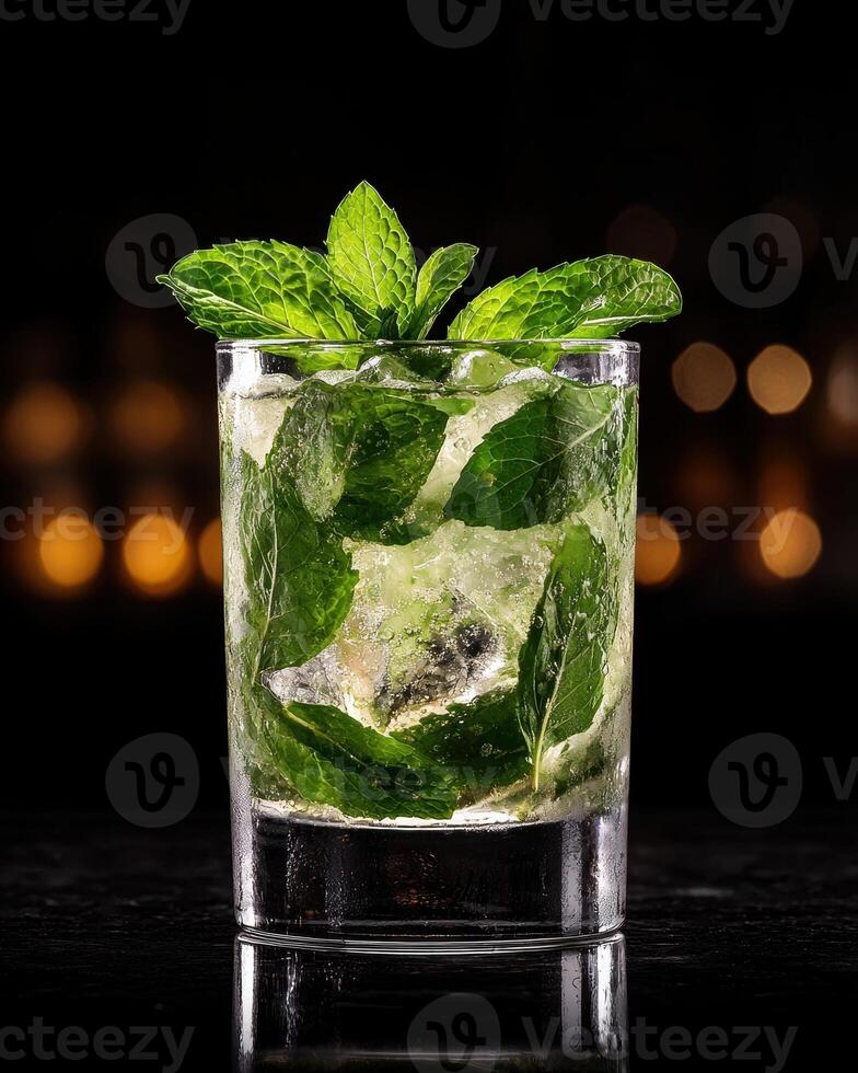 Refreshing mint julep cocktail in a rocks glass with ice photo