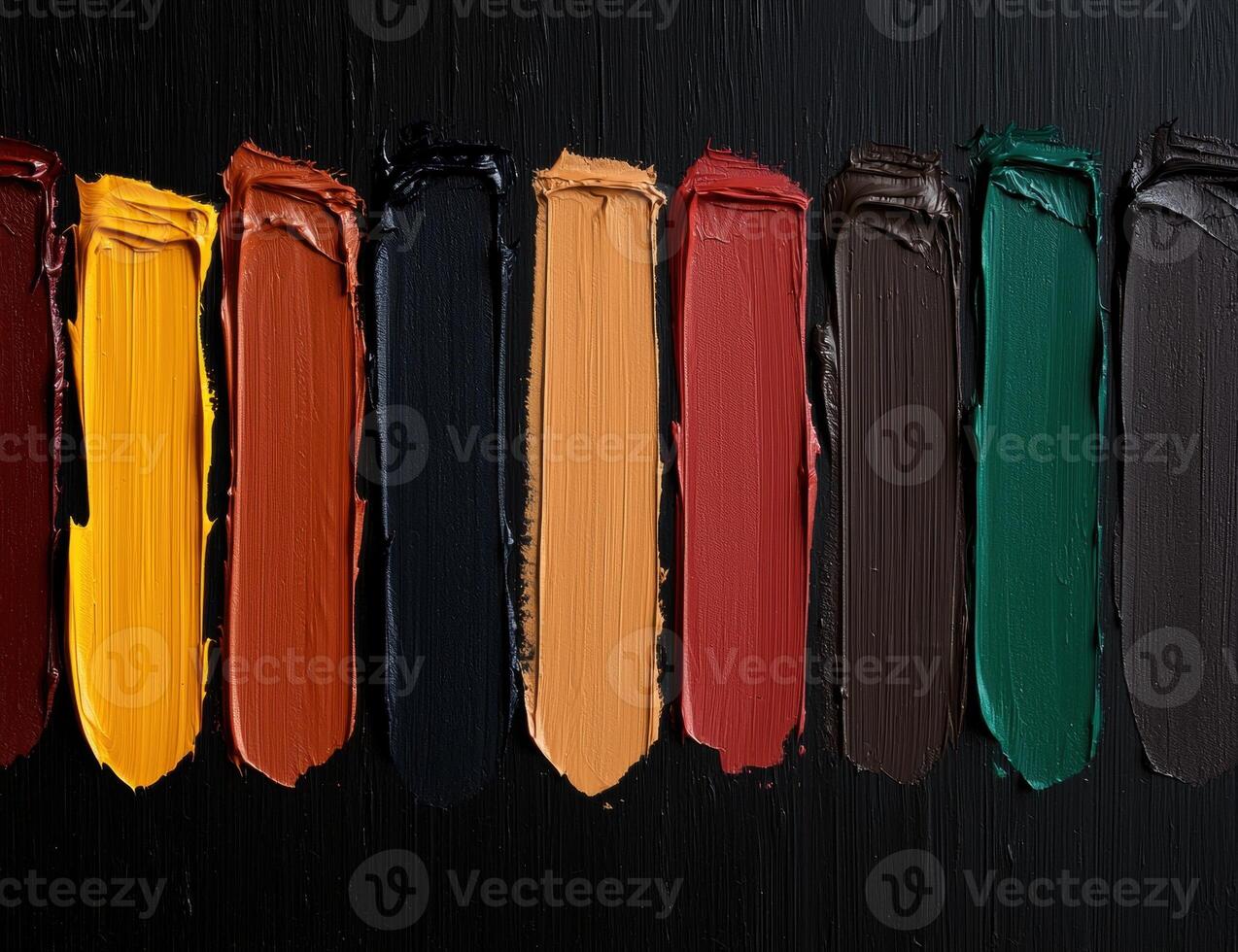 Stripes of colorful paint on black background photo