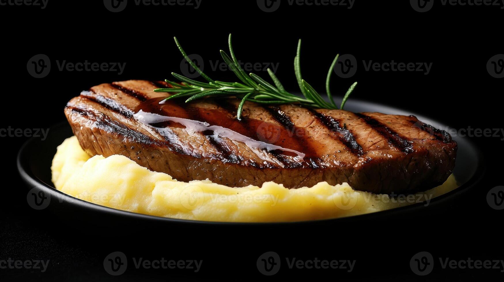 Grilled steak with mashed potatoes and rosemary photo