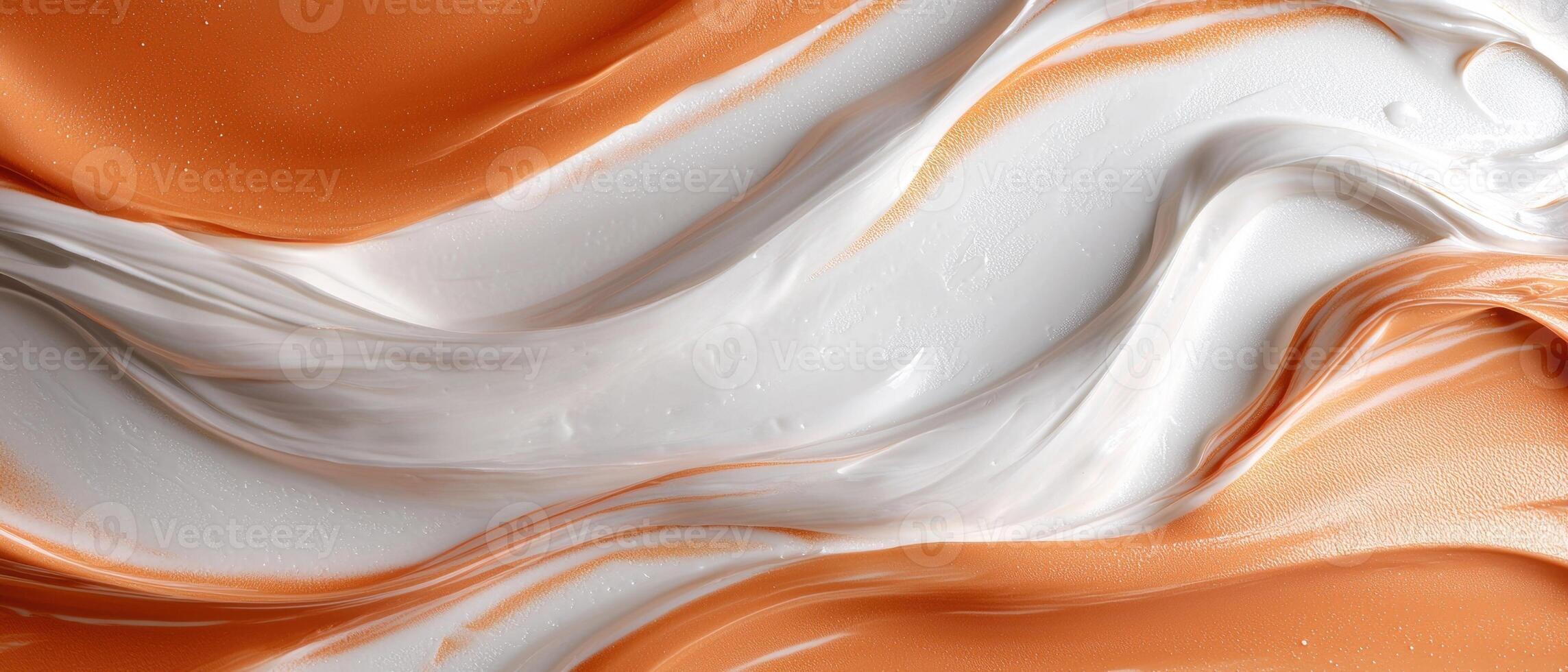 Abstract swirls of orange and white cream texture photo