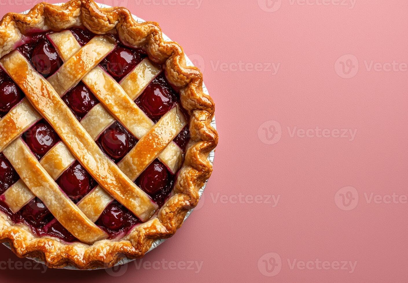 A delicious homemade cherry pie with a lattice crust. photo