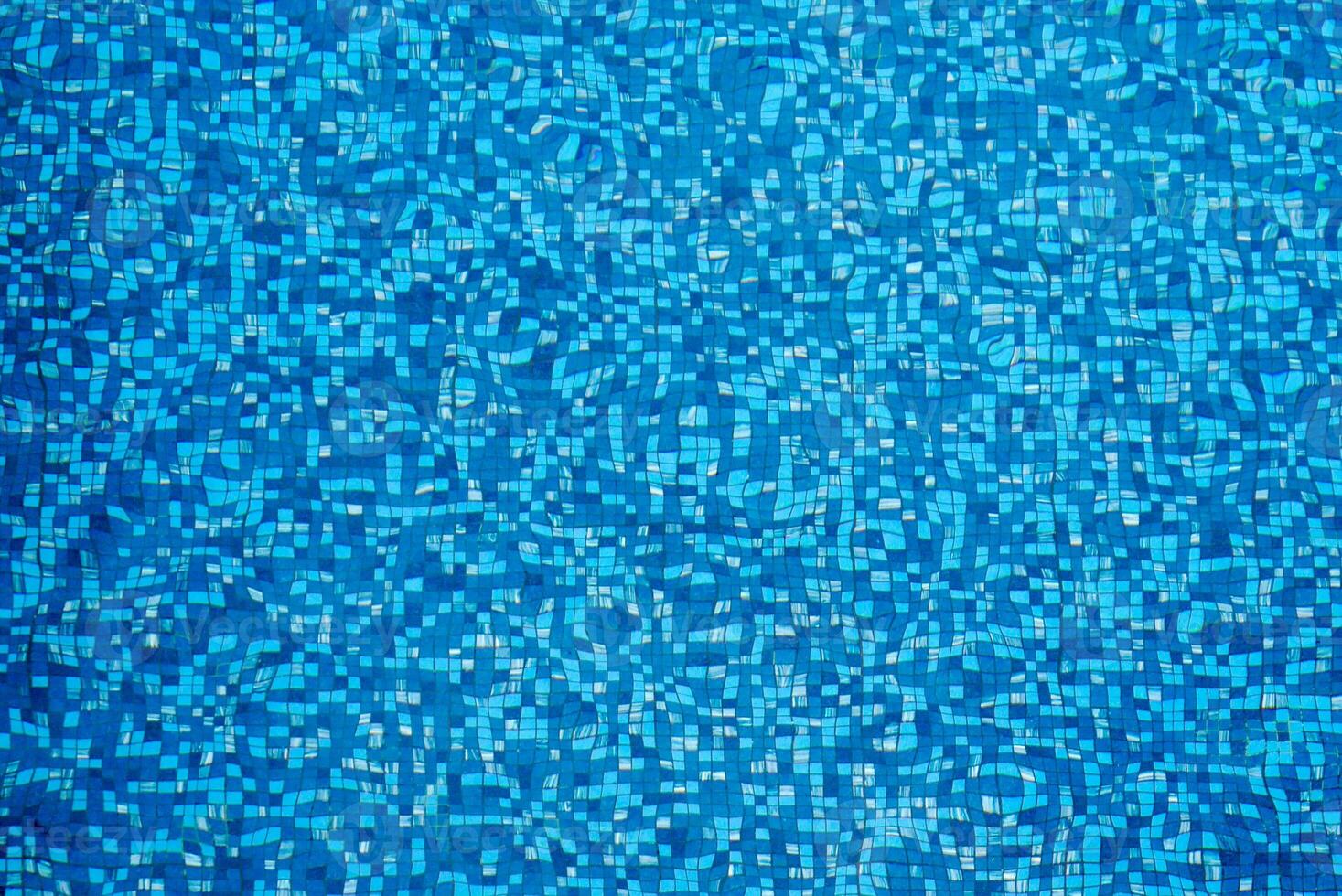 abstract background of ripple blue surface water in swimming pool photo