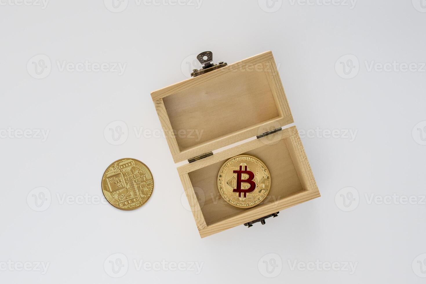 3d illustration of Bitcoins in wooden box on a grey background. with clipping path photo