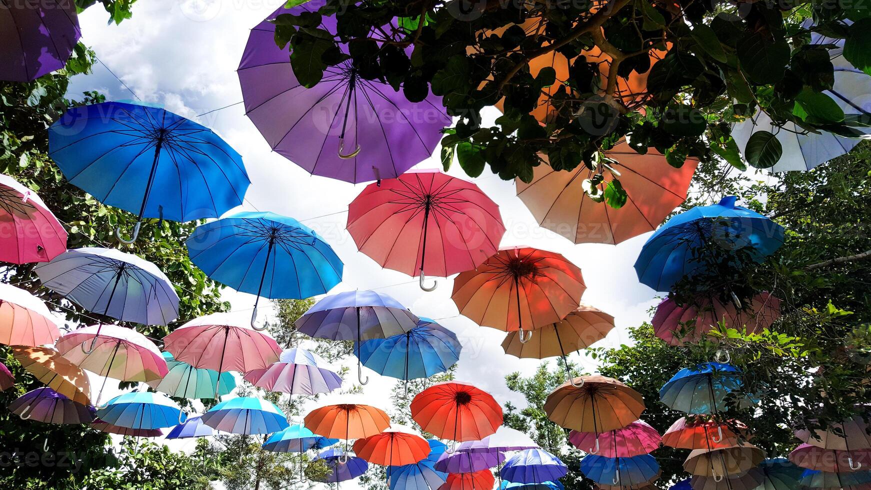 colorful umbrellas central on the corridor photo