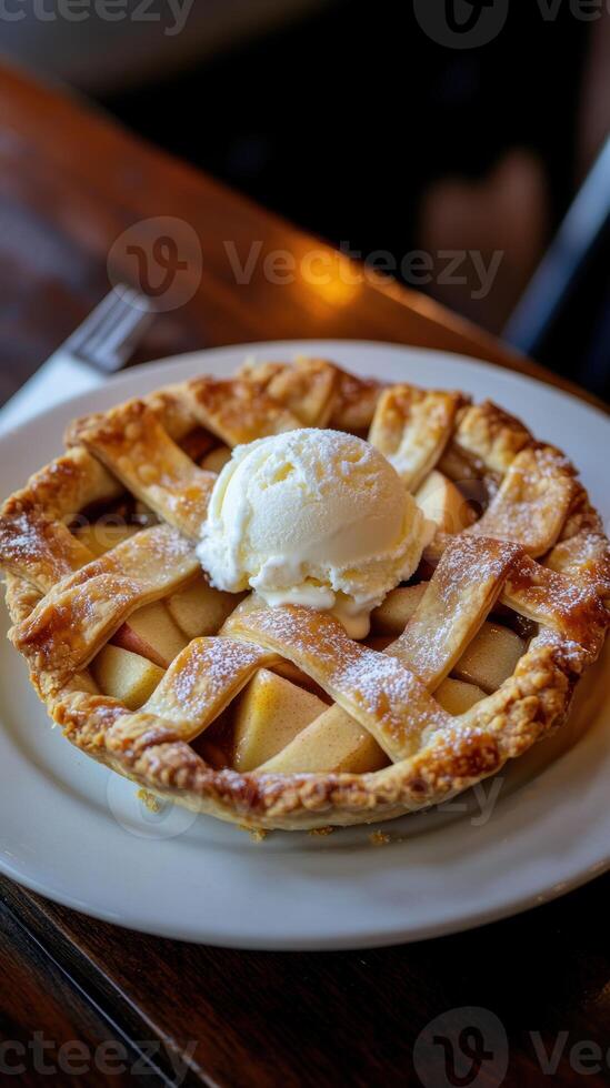 Apple pie with ice cream on wooden background. Selective focus. photo