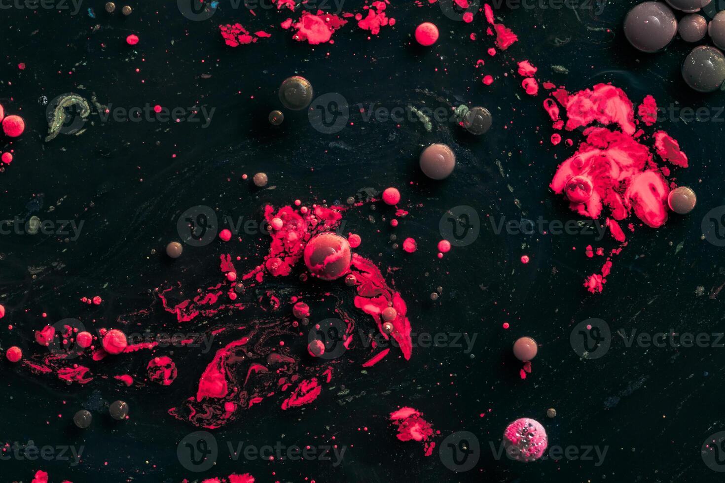 Paint in water. Amazing macro photography in the form of space and planets. photo