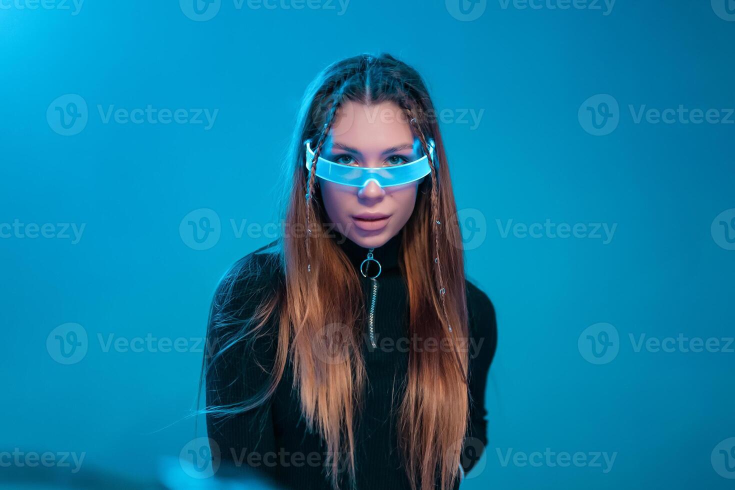 New technologies in glasses. Cyberpunk woman portrait. photo
