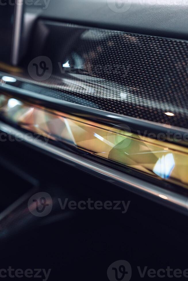 Close-up view of modern car interior features highlighting design elements and craftsmanship with intricate details photo