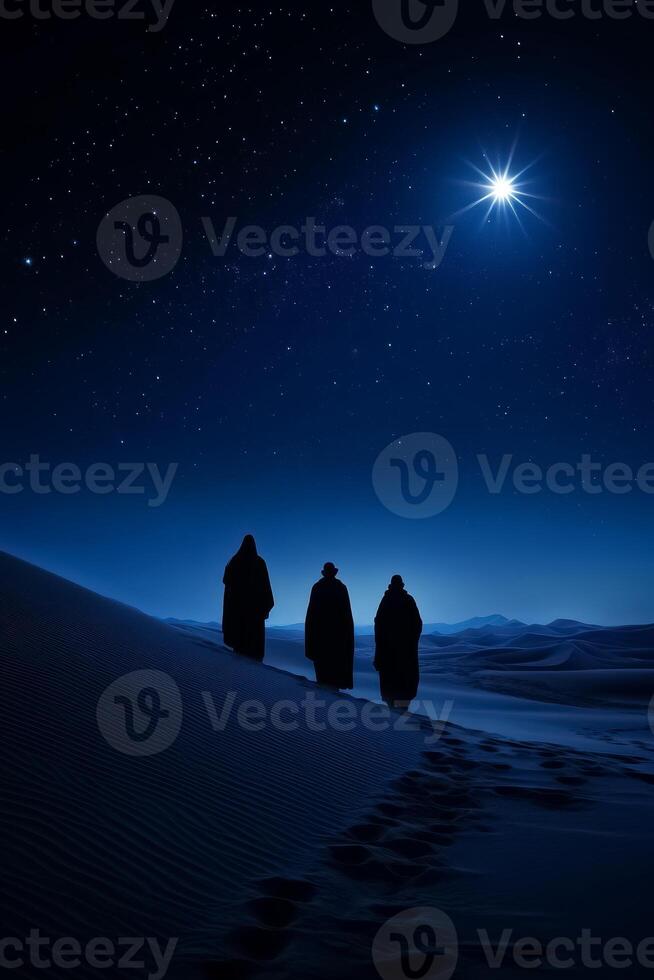 Three silhouetted figures in cloaks walking under a starlit night sky in the desert photo