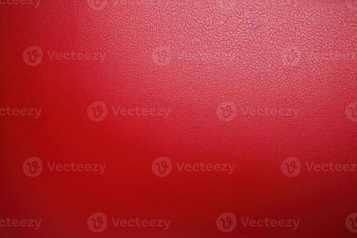Red leather texture background showing grain and creases photo