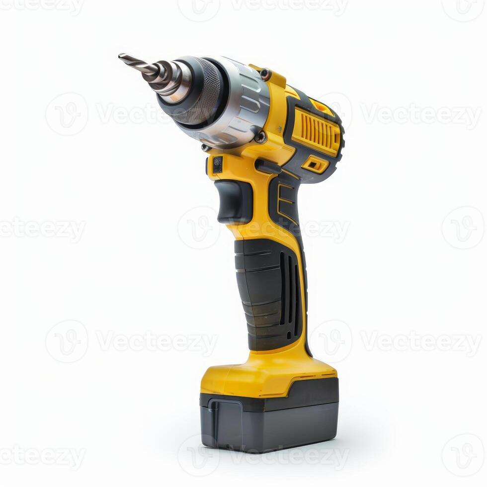 Yellow and black cordless drill with drill bit on white background photo