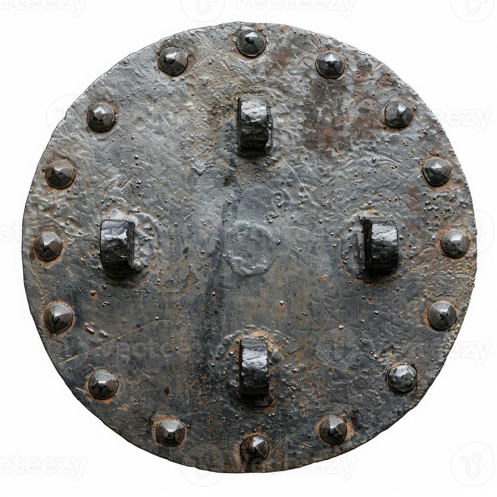 Round forged metal shield with rivets and handles, showing wear and tear photo