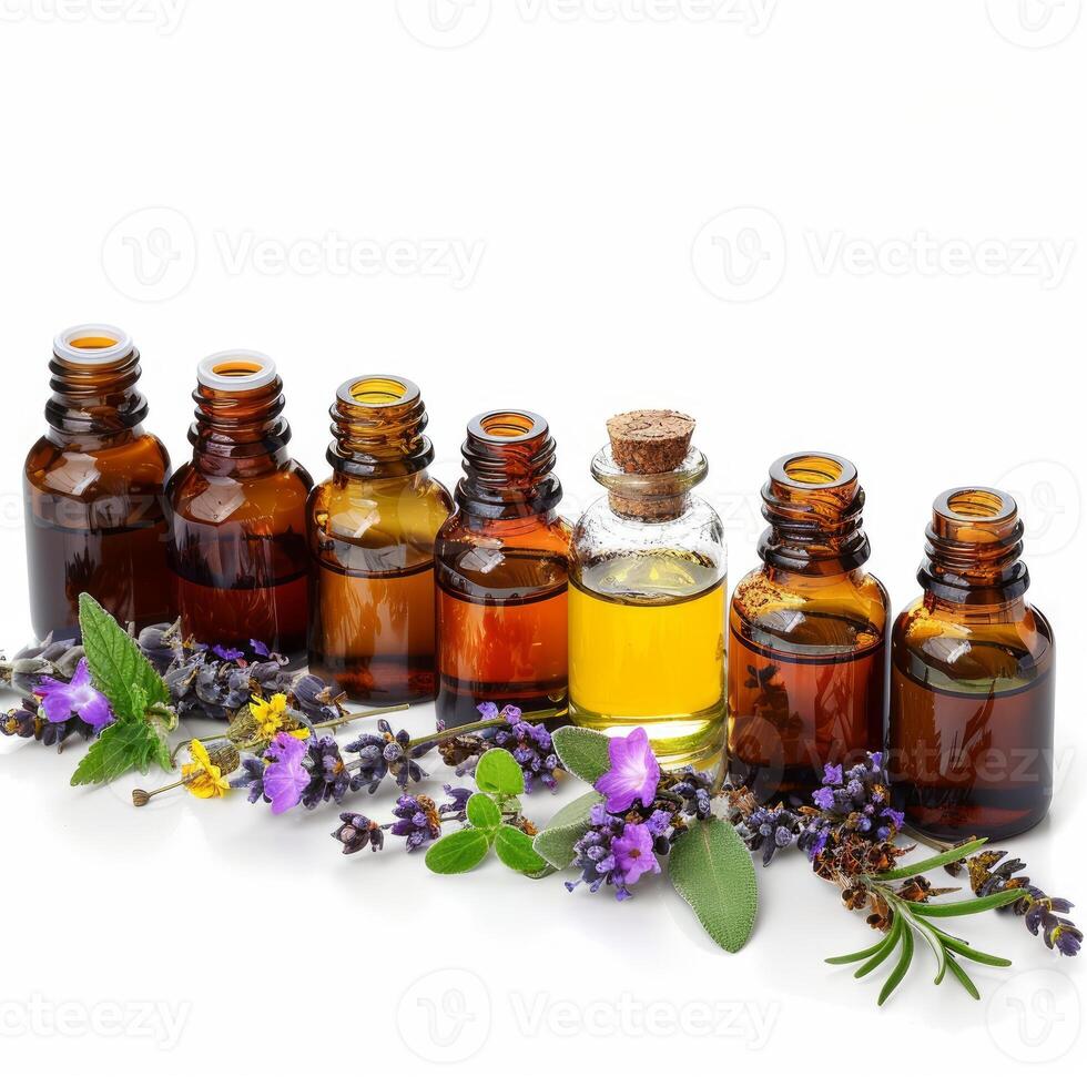Bottles of essential oil with fresh herbs and flowers creating aromatherapy photo