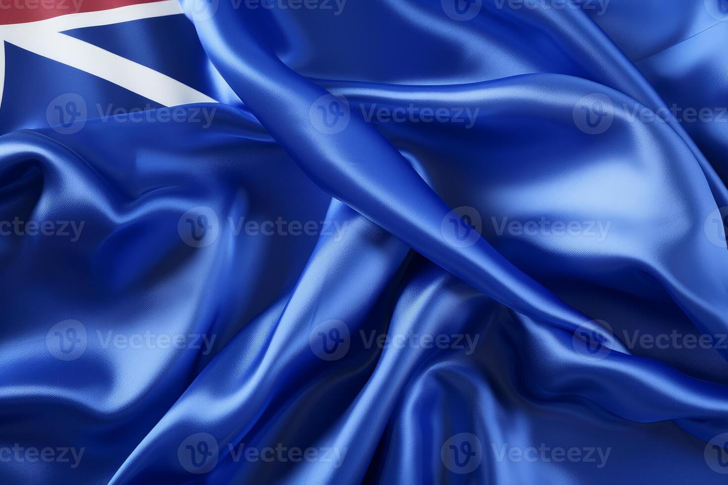 Flag of new zealand flowing in the wind, showing its distinctive blue ensign and union jack design photo