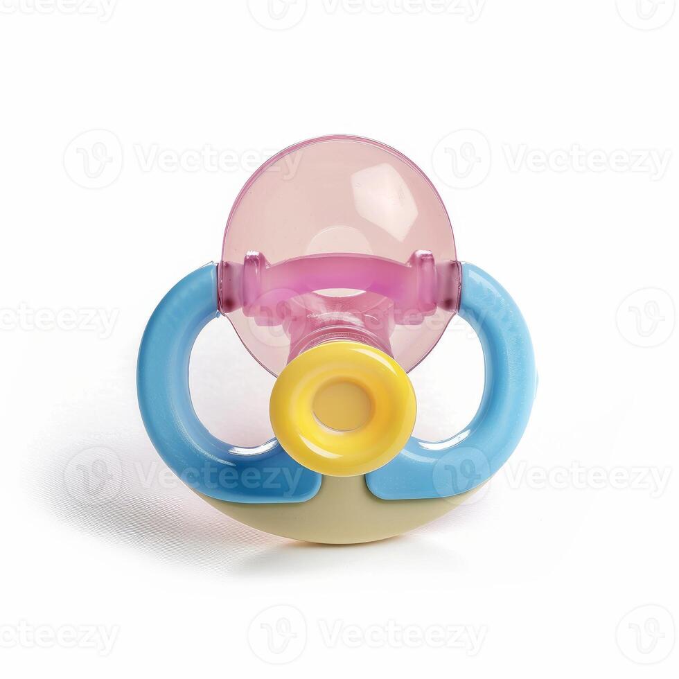 Baby pacifier isolated on white background showing pink and blue handles photo
