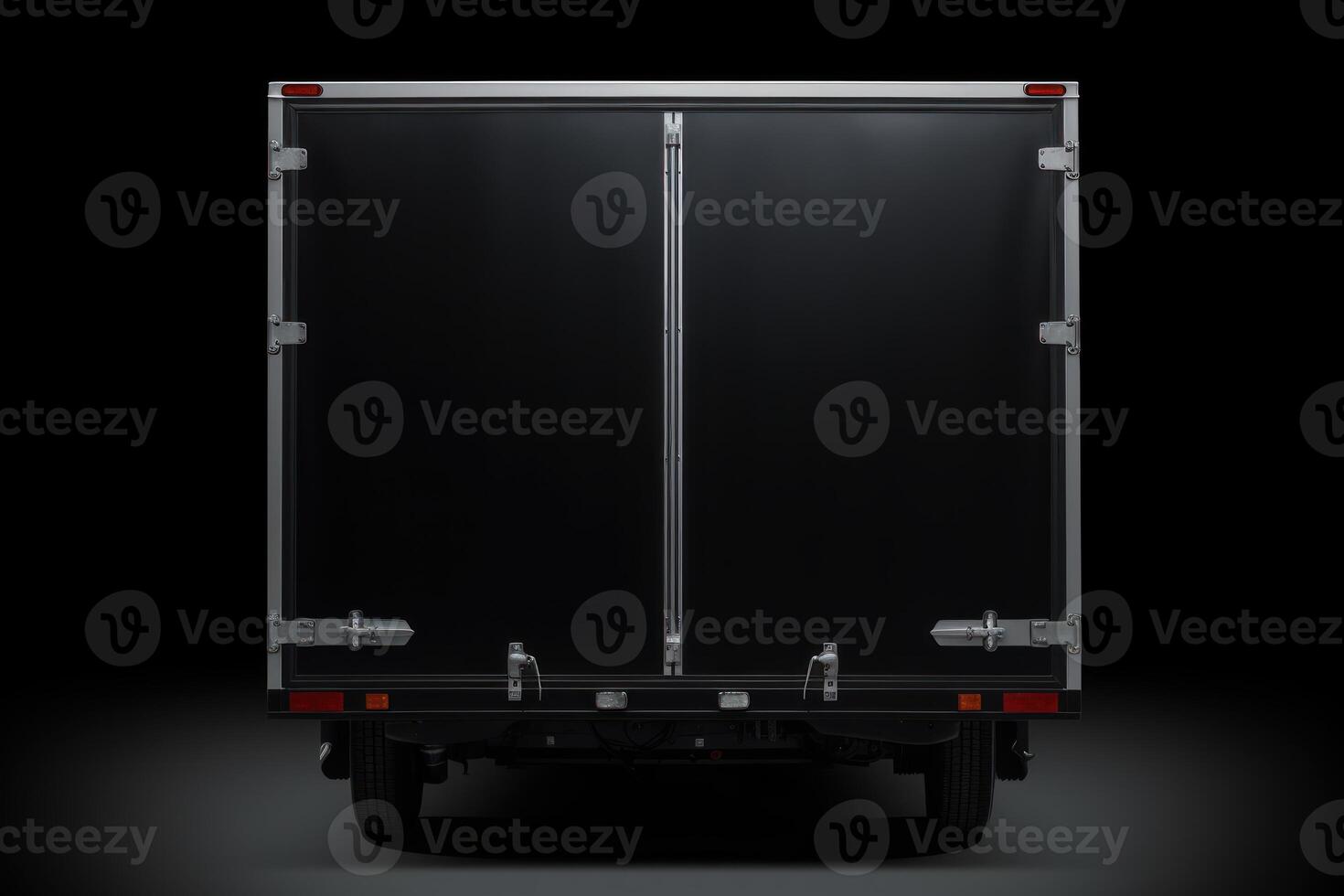 Closed black delivery truck on dark background photo