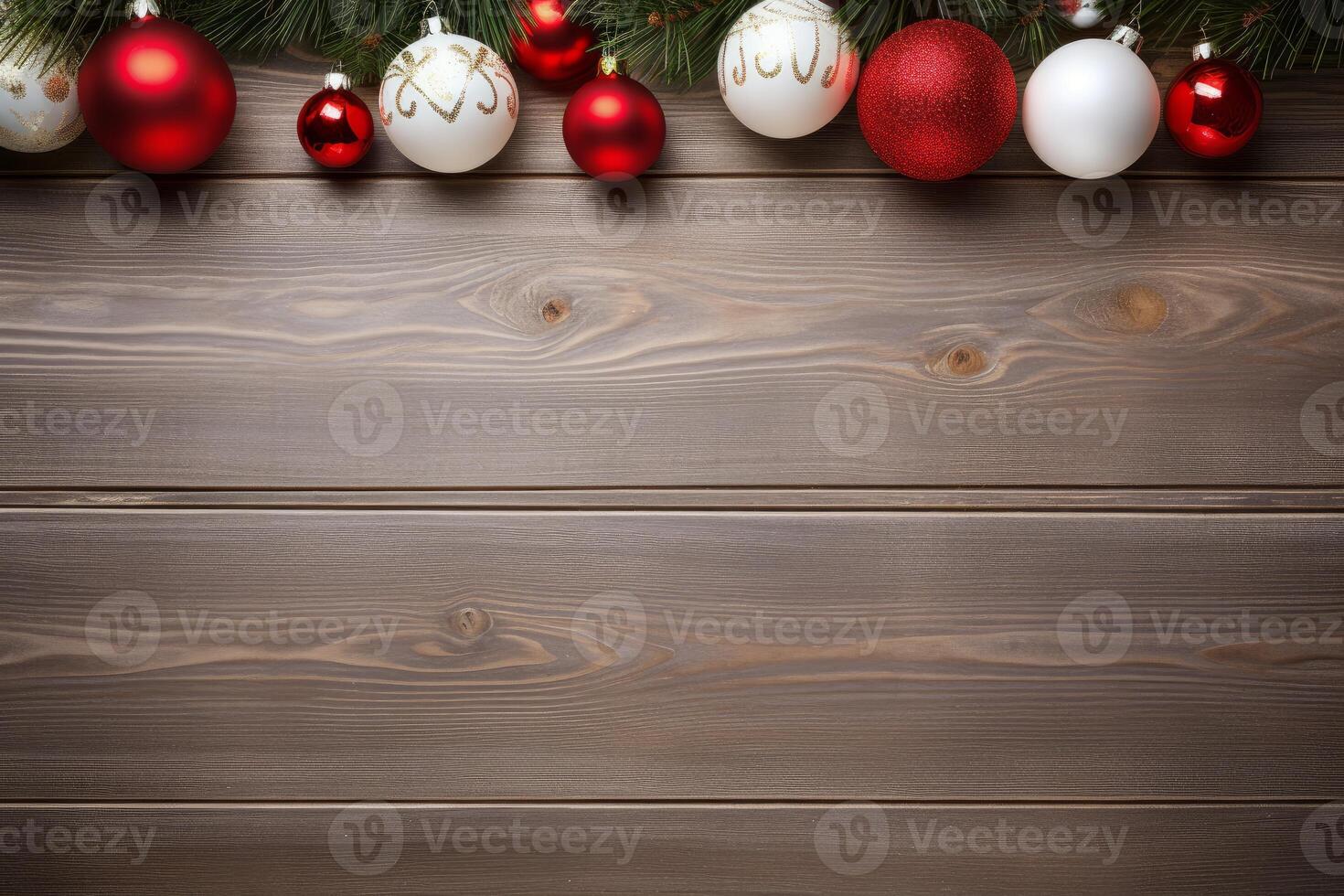Christmas ornaments hanging on a rustic wooden background with copy space photo