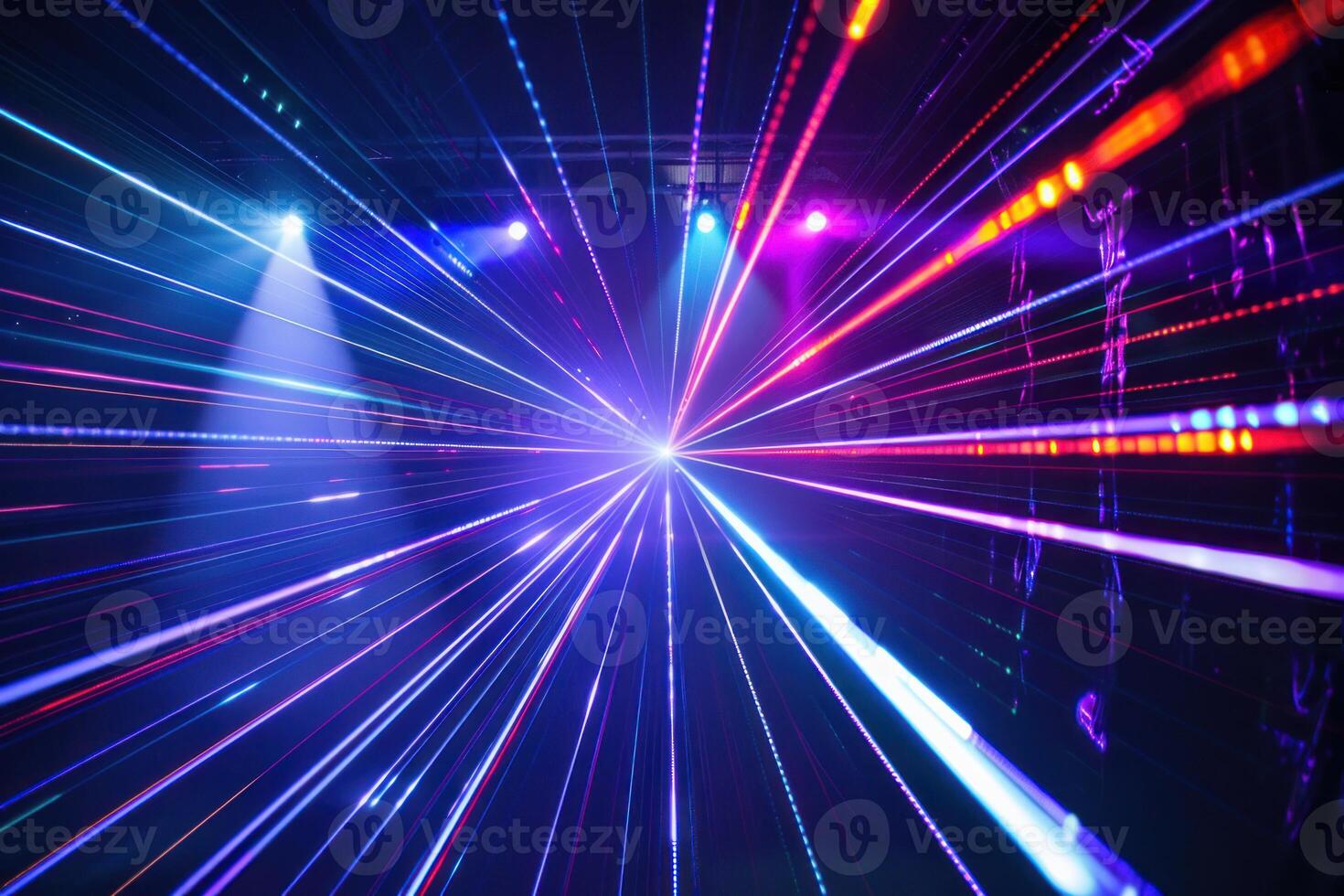 Colorful laser lights beams creating a stunning visual spectacle at a concert photo