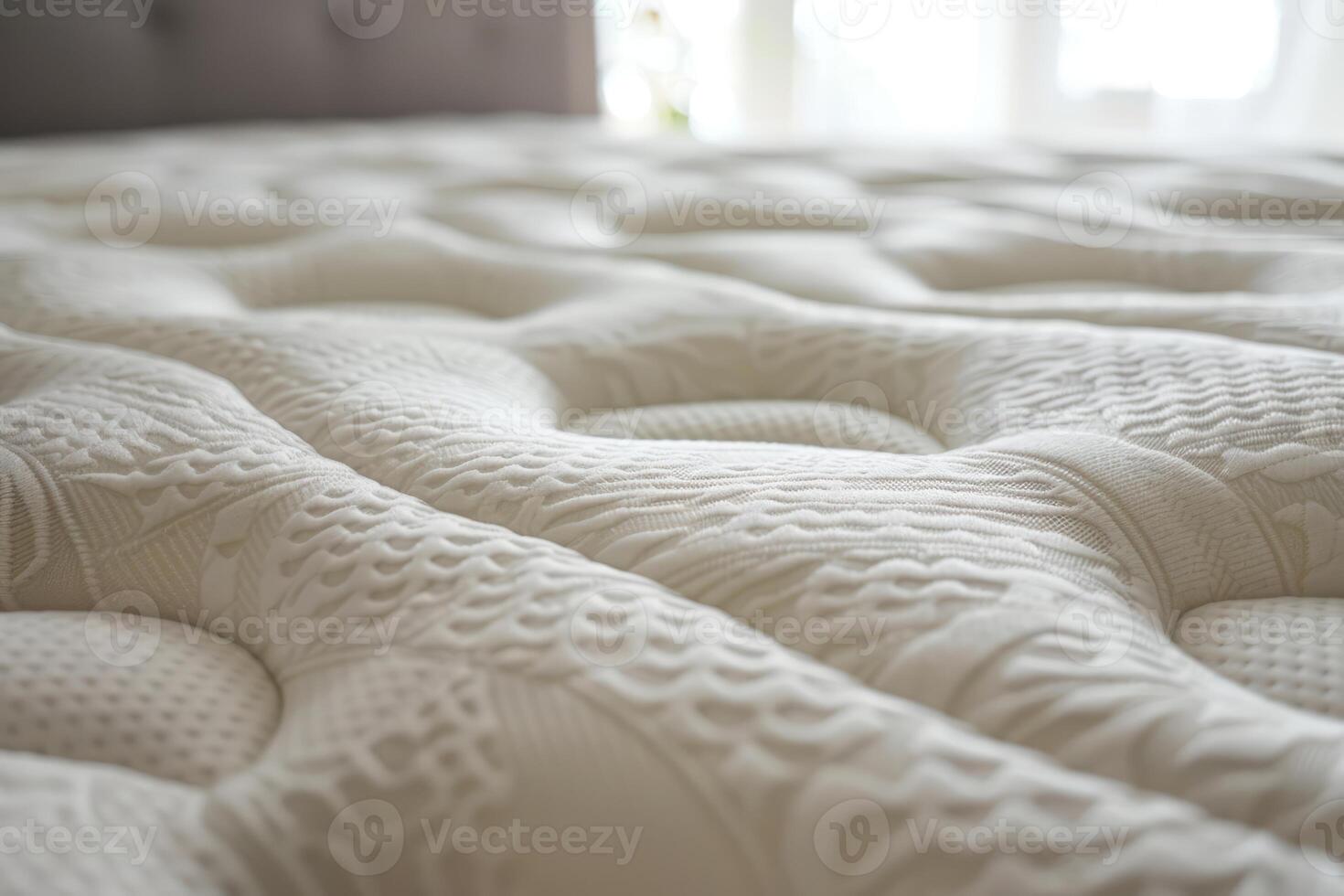 Comfortable mattress surface inviting restful sleep in bedroom photo