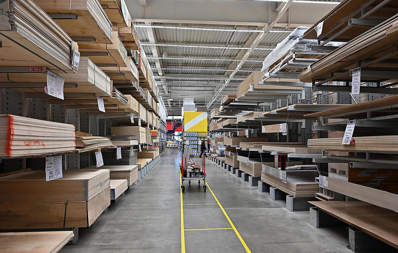 Building materials, things for the house and buyers in the big shop On a wonderful day photo