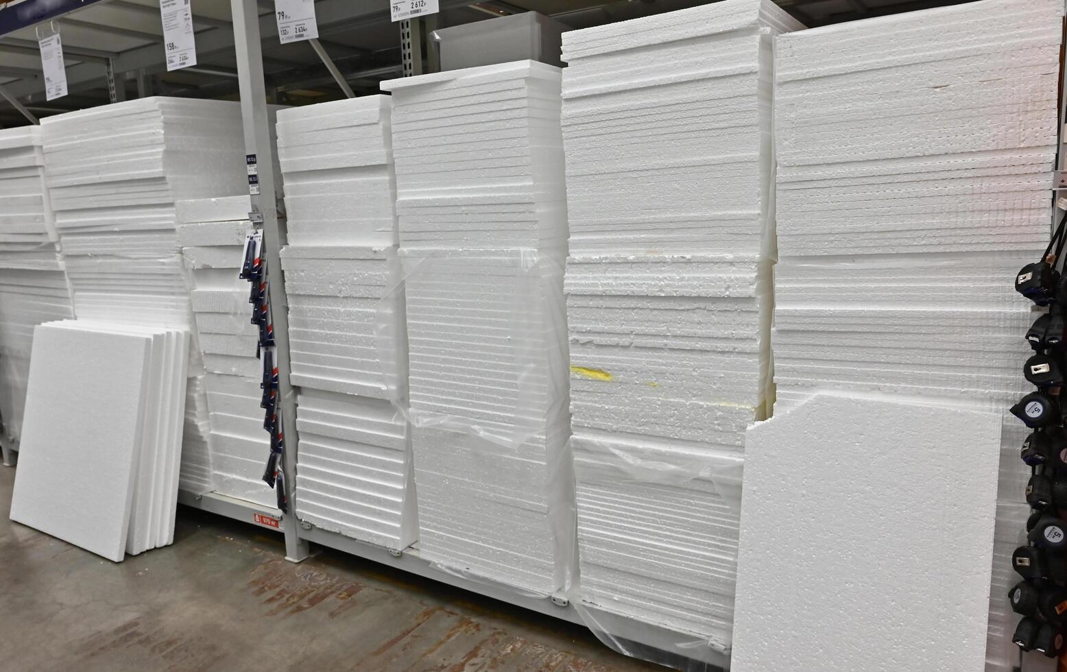 Building materials, things for the house and buyers in the big shop on a beautiful sunny morning photo