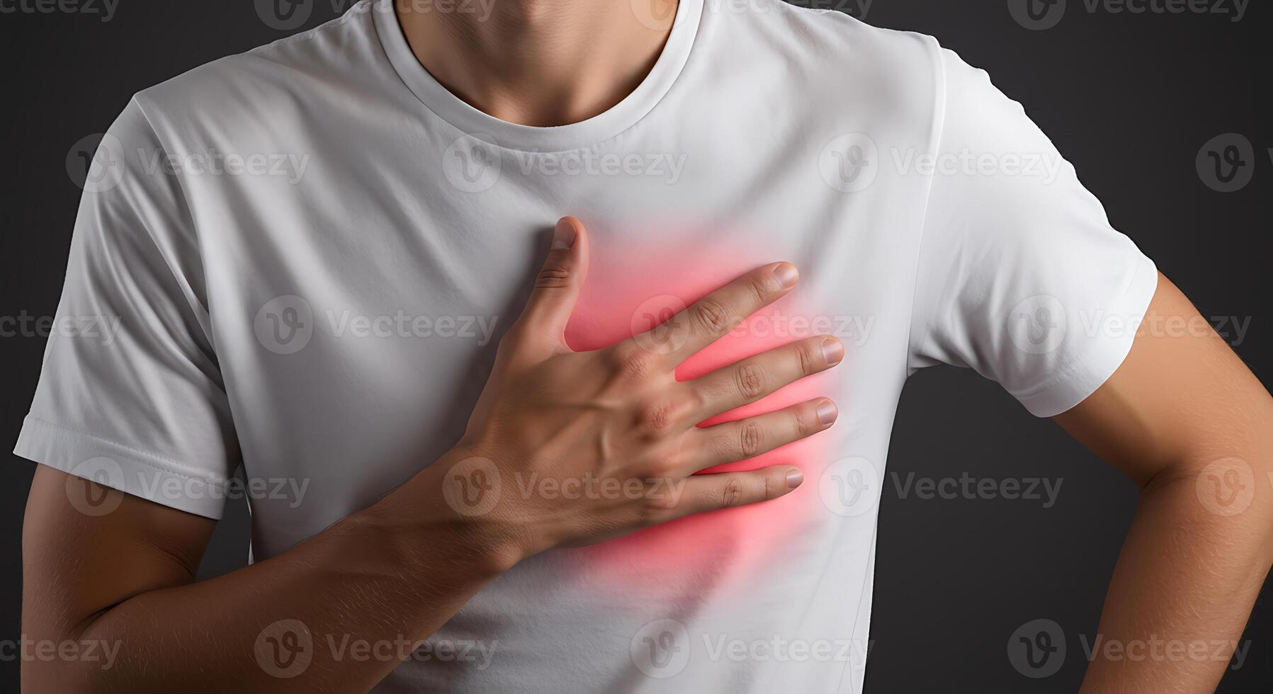 Man in white shirt with chest pain photo
