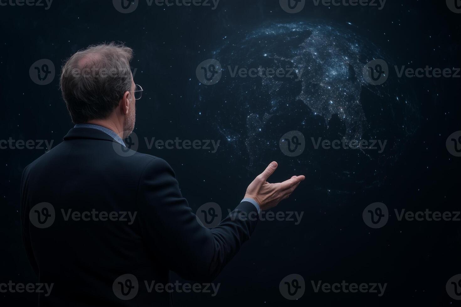 A man in a suit stands under a dark starry sky, gesturing toward a glowing digital Earth, symbolizing technology, global connection, and innovation photo