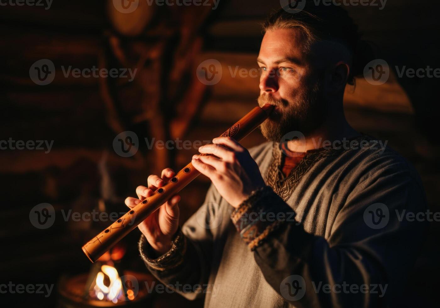A Viking musician playing a wooden flute carved with Nordic symbols. Imbolc festival celebration photo