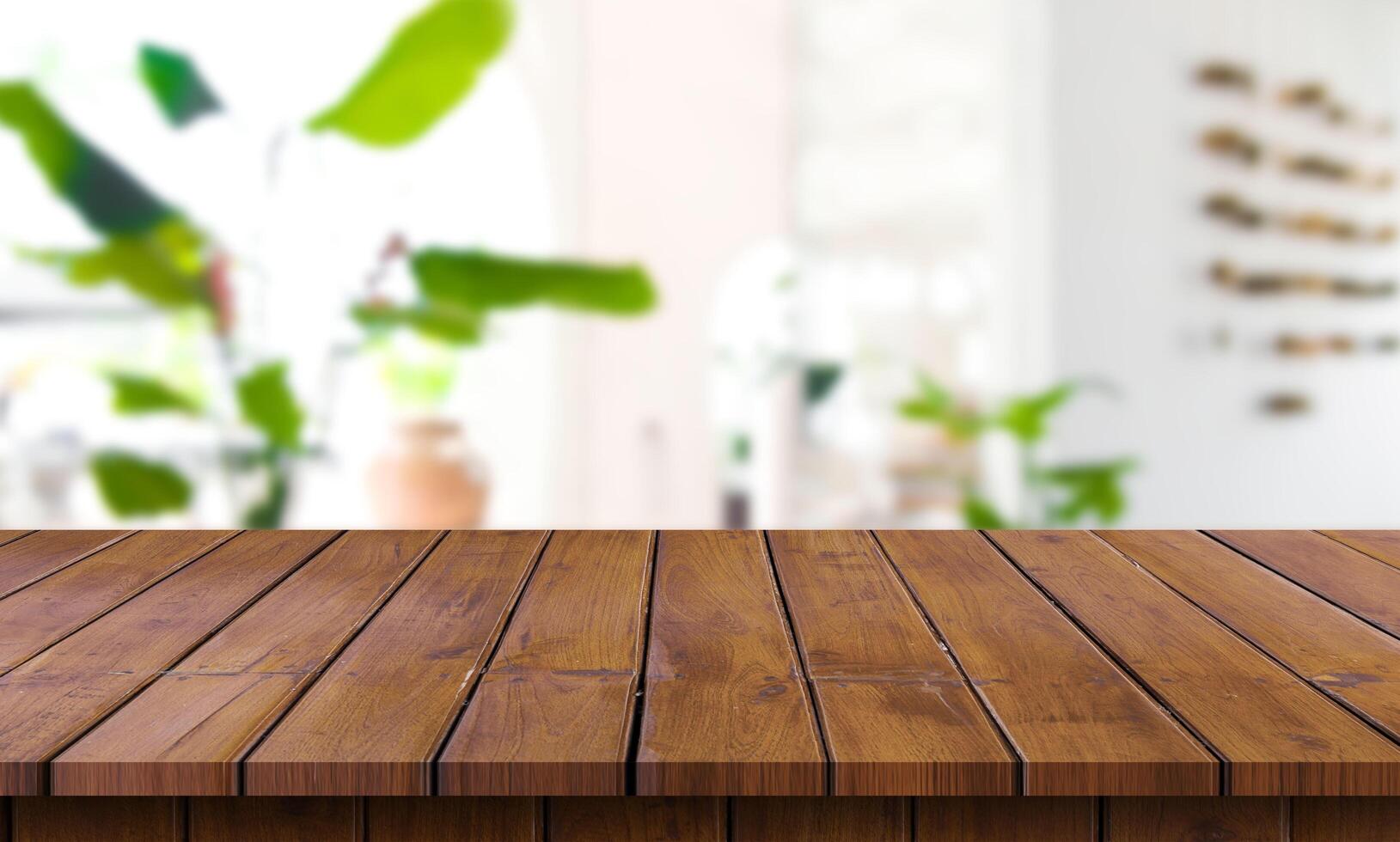 Table top with wooden surface and blurred background photo