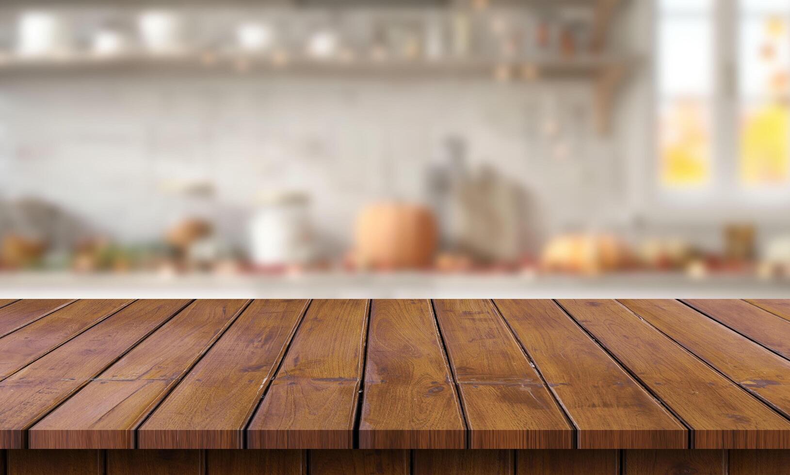 Wooden table top on blurred kitchen background photo