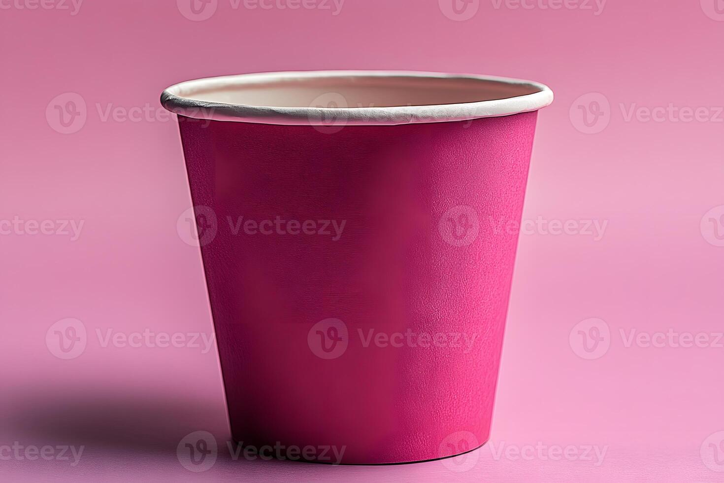 Vibrant Pink Paper Cup on Soft Pink Background for Party and Event Design photo