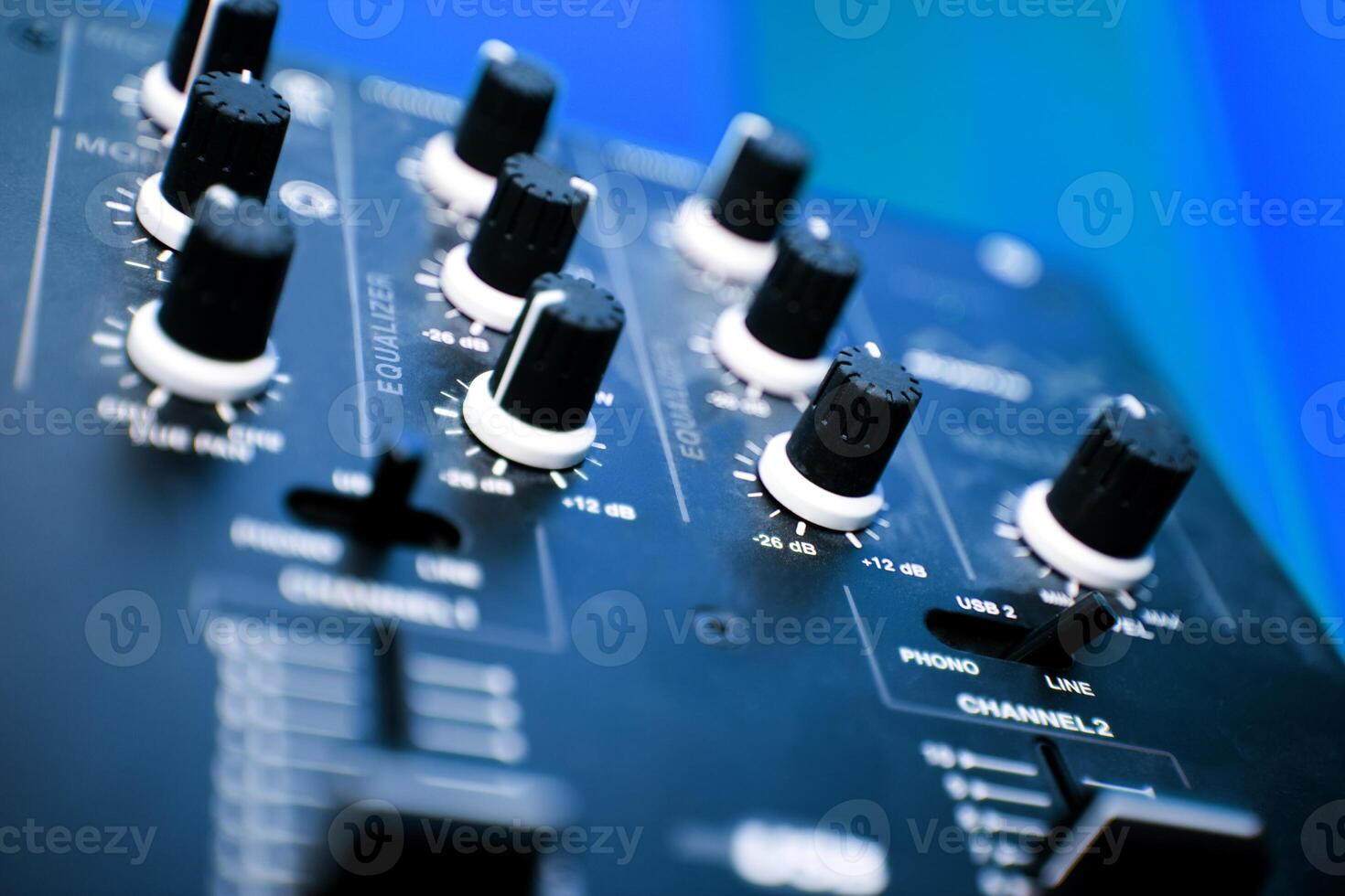 Close up image of mixer in blue toned.Music objects photo