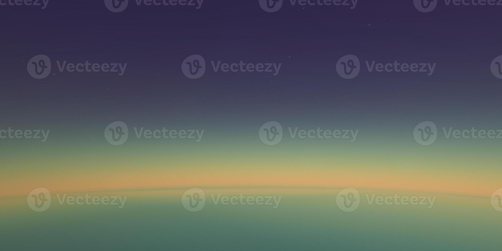 Abstract earth horizon gradient at twilight with deep blue and golden hues photo
