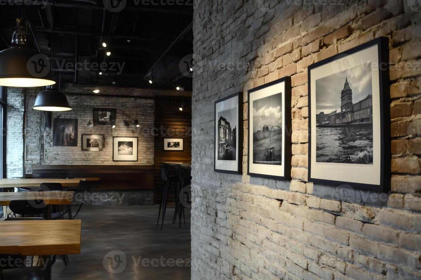 Modern restaurant interior design showcasing framed photography on brick wall photo