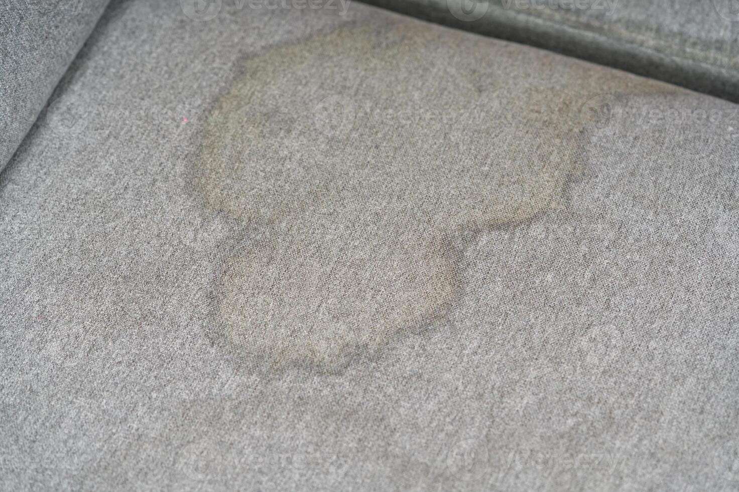 Dirty, stain, blot , fleck of water on the fabric, textile sofa. Dirty textile sofa chemical cleaning Dirty textile sofa chemical cleaning. upholstered furniture cleaning concept photo