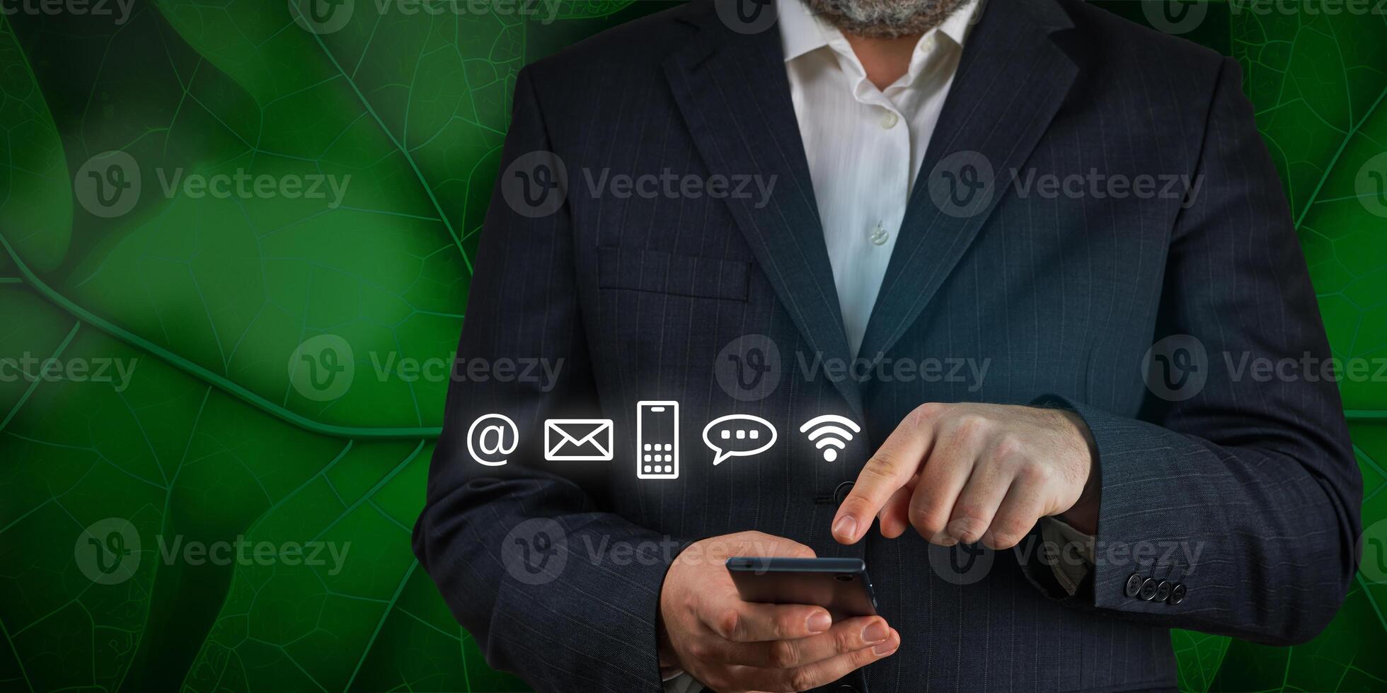 contact us concept using smartphone. Businessman holding mobile smartphone with icons. mail, phone, email. Cutomer support concept photo
