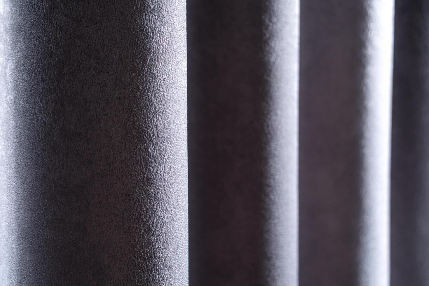 A close up of a curtain with a dark gray color photo