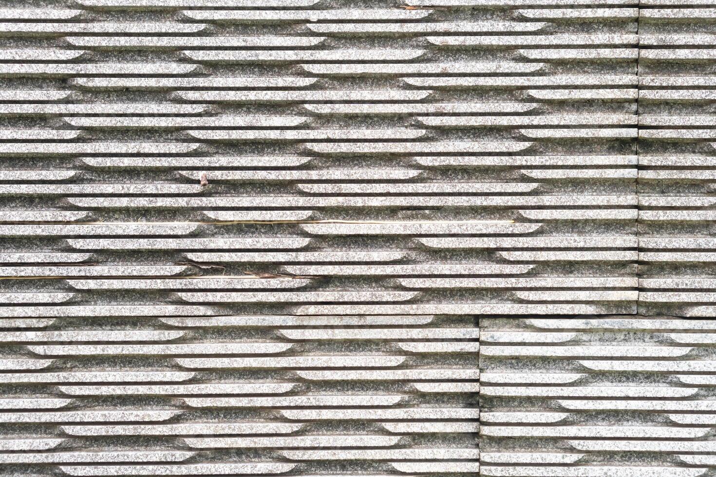 Textured Stone Wall with Grooves photo
