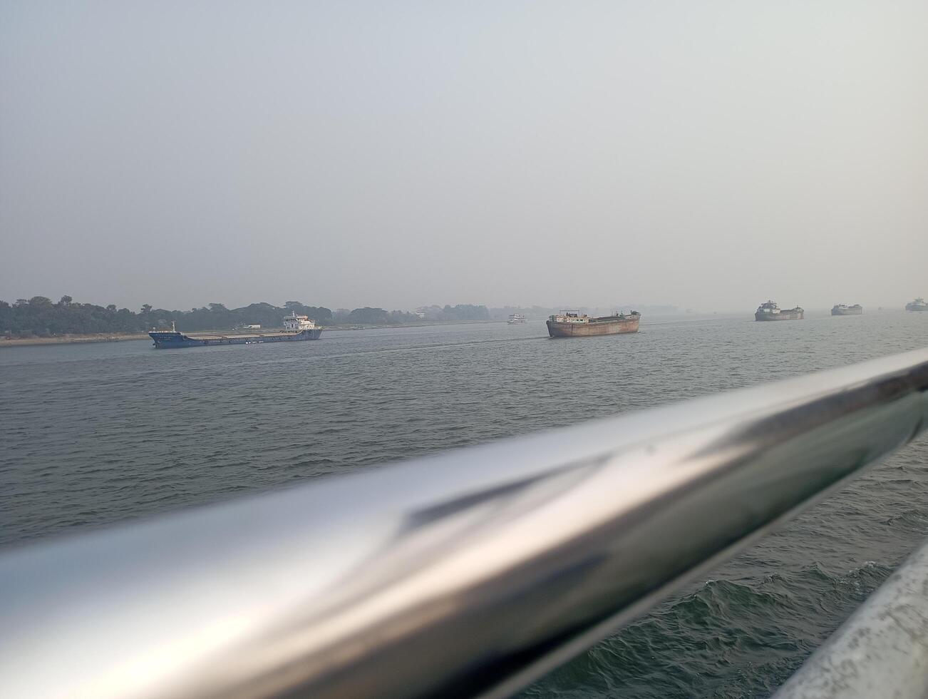 a view of a body of water from a railing photo