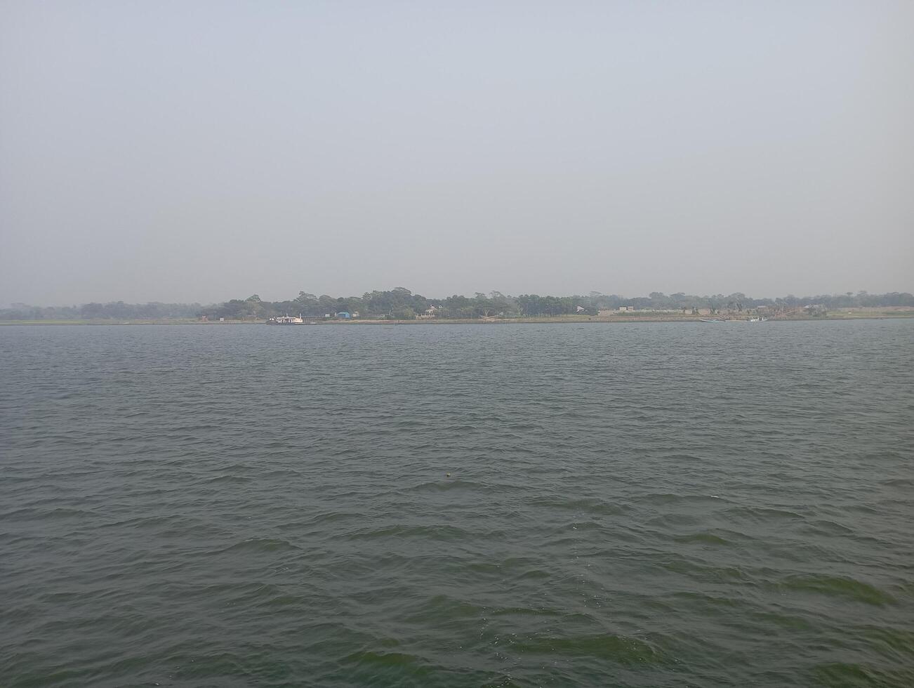 a view of the water from a boat on a lake photo