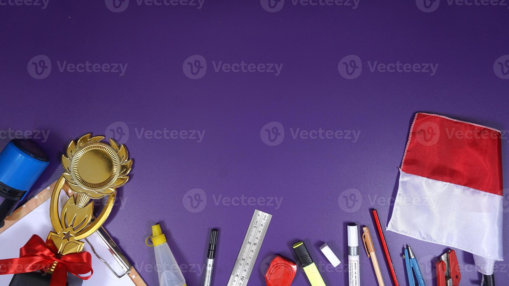 School Stationery with Notebook and Wooden Board Isolated on Purple Background with Copy Space area Back to School Concept photo