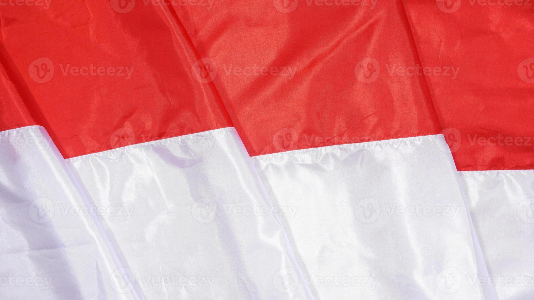 Red and White National Flag of Indonesia as Background for Copy Space photo