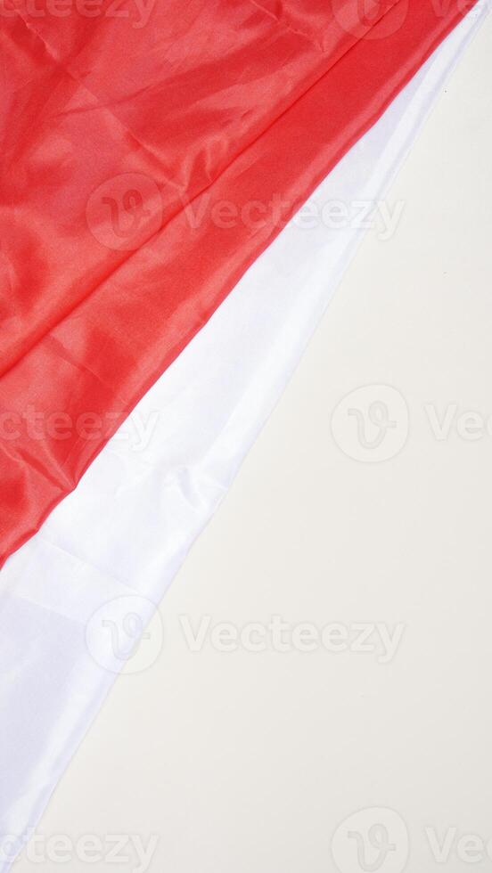 Independence Day of Indonesia Concept with Red and White Flag on Light Background photo