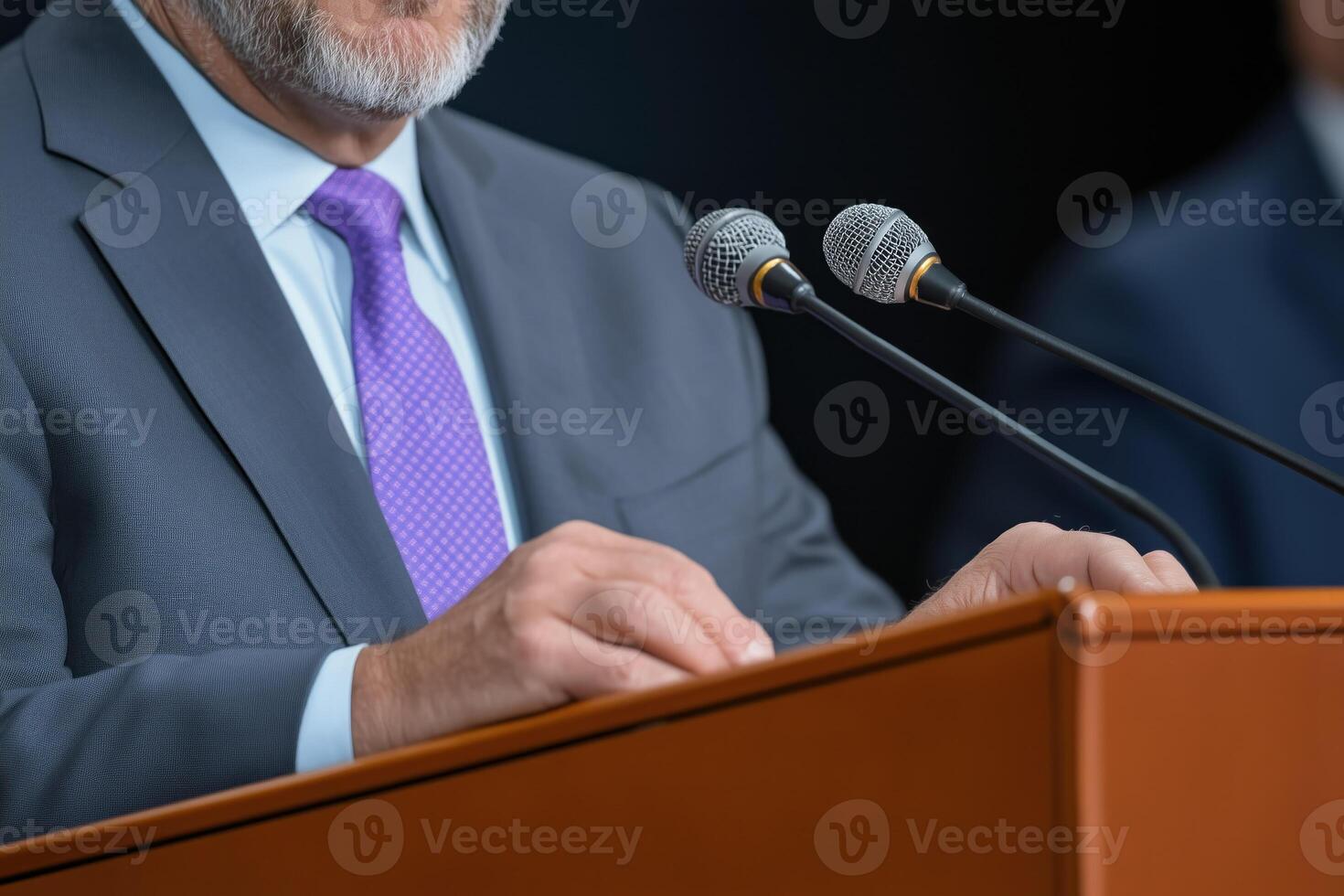 Close-up of a speaker making a speech at a conference. photo