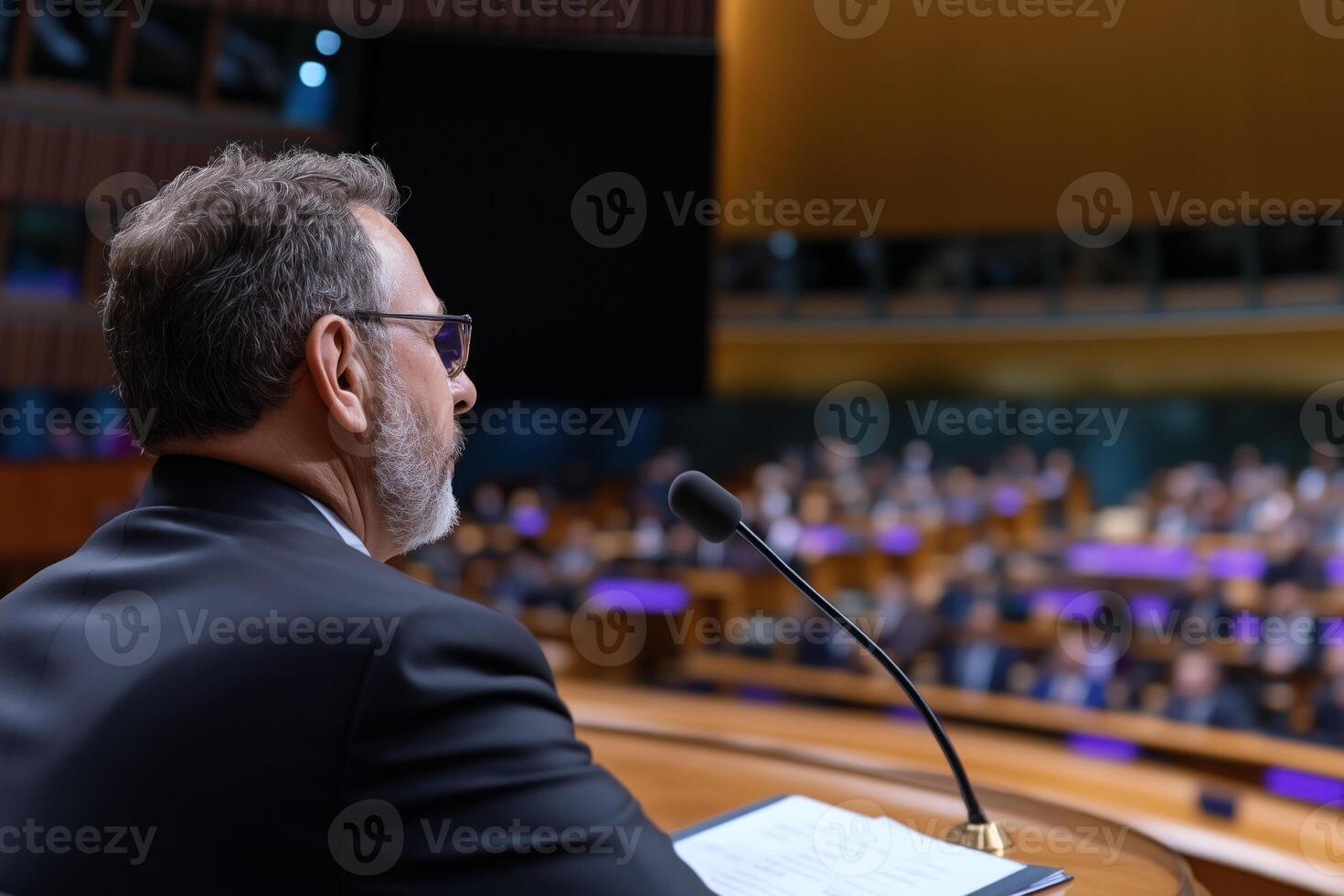 Speaker giving a speech at the conference photo