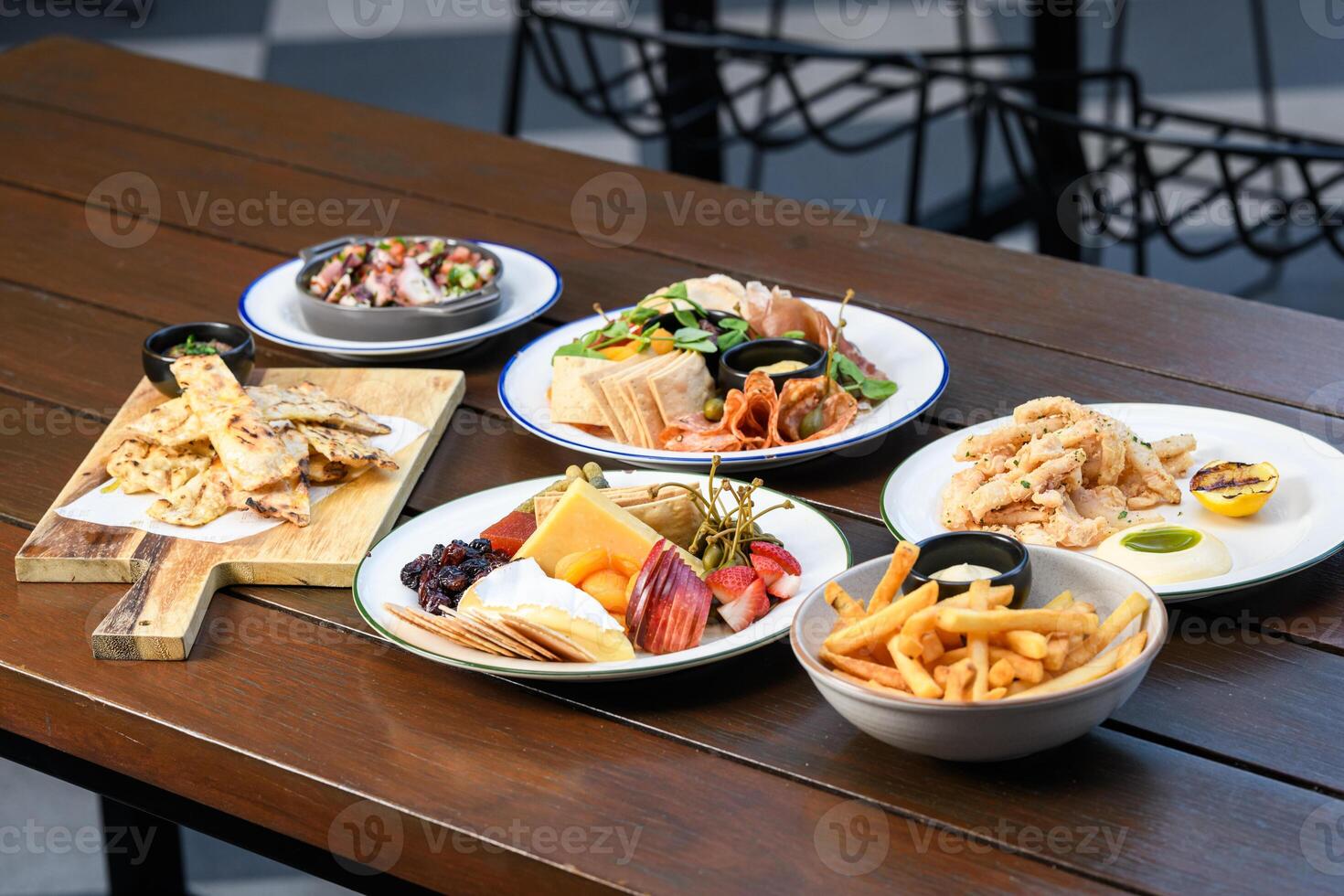 A table with plates of food on it photo