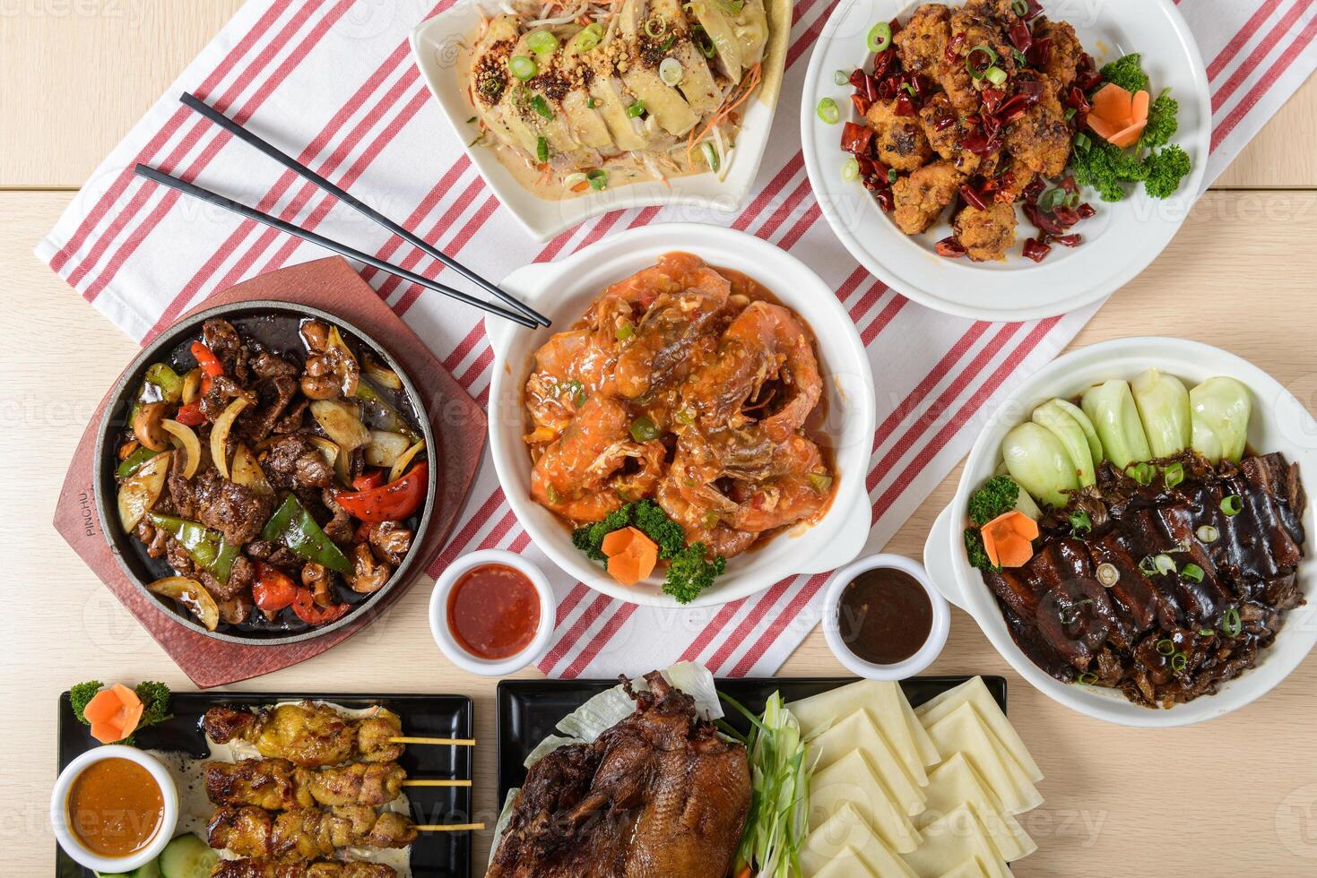 A table with many plates of food on it photo